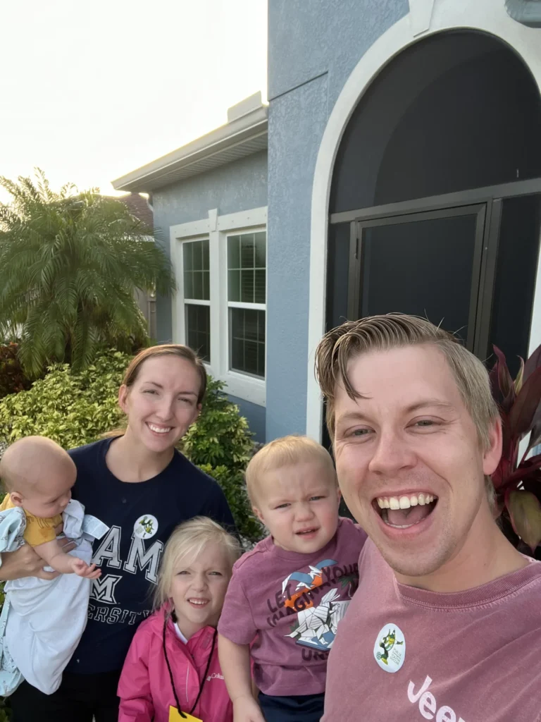Cory Richter, a local Parrish handyman, smiling with his family.