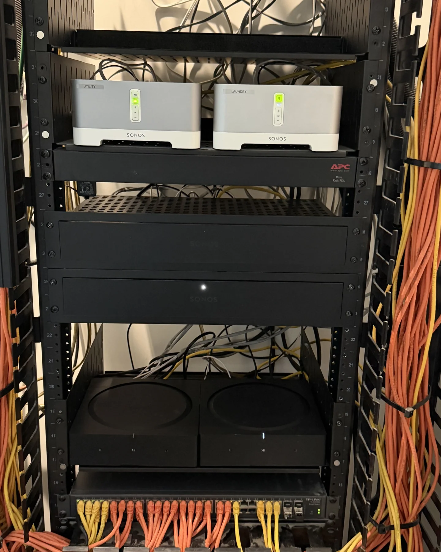 Whole-home Sonos audio and network equipment rack during system upgrade