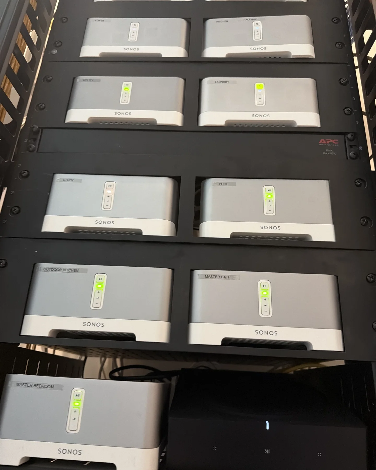 Sonos whole-home audio equipment labeled for individual rooms and outdoor areas